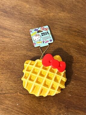 Hello Kitty Yellow Waffle Charm with Red Bow Squishy